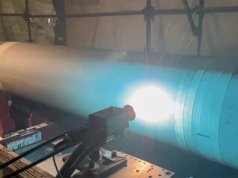 Metal spraying worn shaft